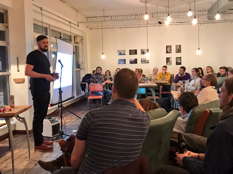photo of Dr Mathew Hoskins speaking at Pint of Science
