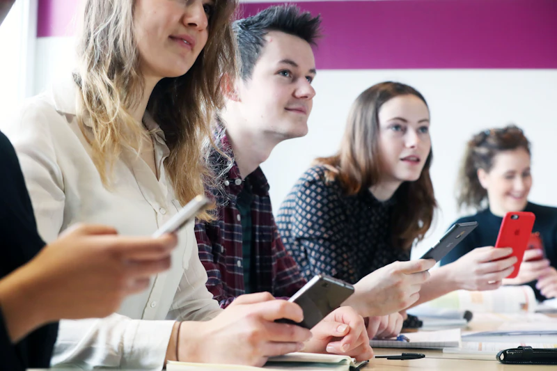 Students with phones in Languages for All class