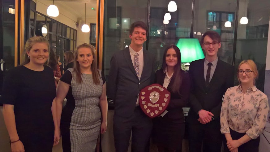 Cardiff students Charles Wilson and Sophie Rudd (centre) with their fellow finalists at the National Negotiation Competition.