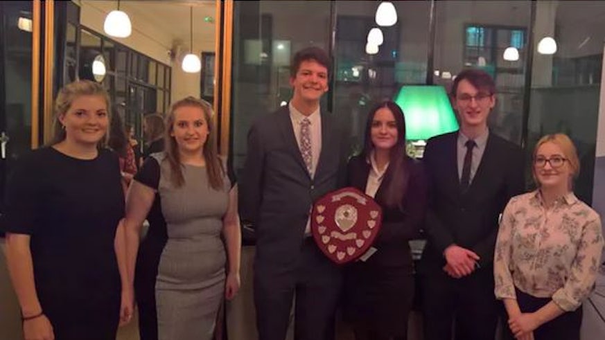 Cardiff students Charles Wilson and Sophie Rudd (centre) with their fellow finalists at the National Negotiation Competition which took place earlier this year.