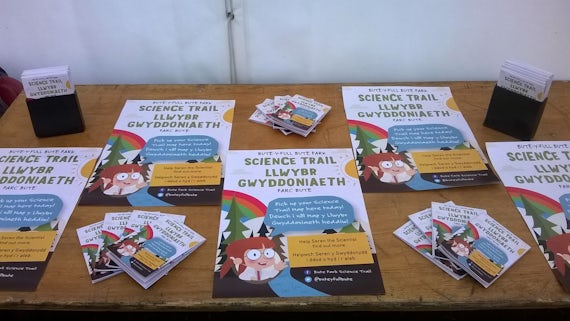 Science trail posters on a table