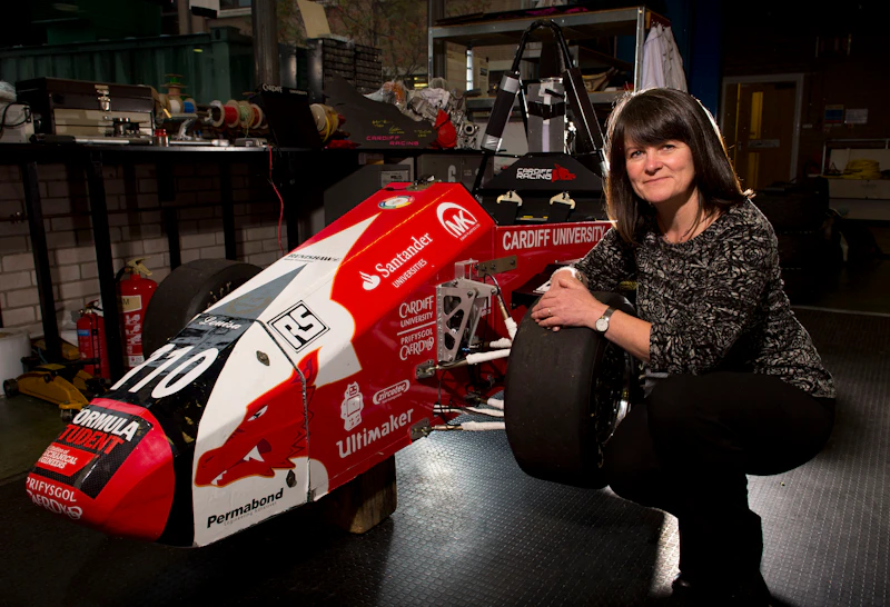 Karen Holford and formula one car 