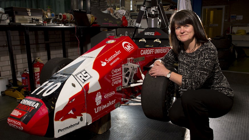 Karen Holford and formula one car 