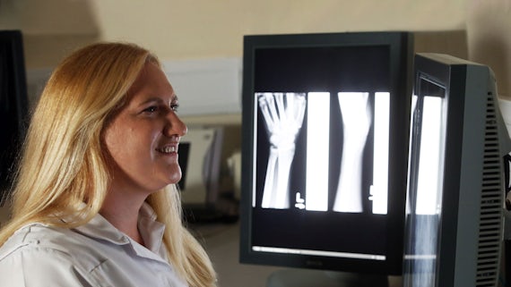 Woman looking at an x-ray