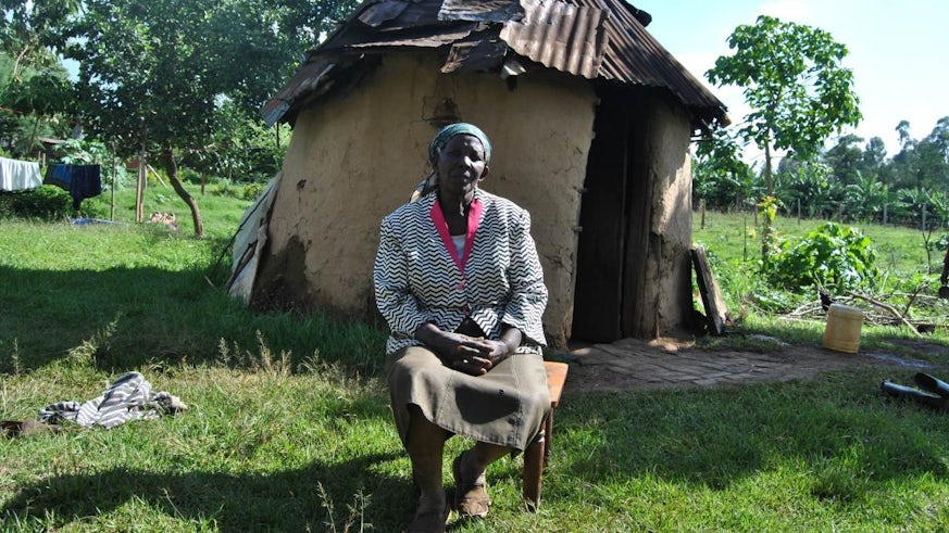 Rachel Korir sits in front of her home in Kapcheboi, Kenya, 6 May 2019. Copyright Thomson Reuters Foundation/Dominic Korir.