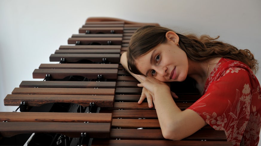 A picture of Darcy resting on her marimba