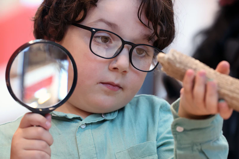 Child taking part in the festival of social science