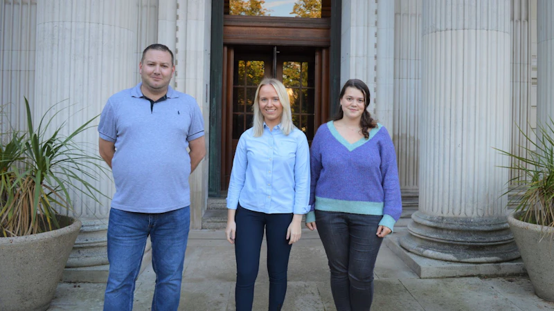 Image of three winners of bursaries to study at the school
