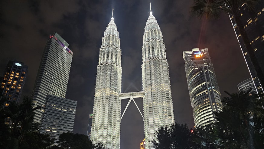 The iconic Petronus Twin Towers in the evening, taken from KL Suira park