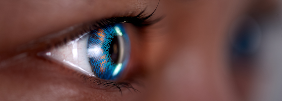 A picture of a lady's eye with blue contact lenses