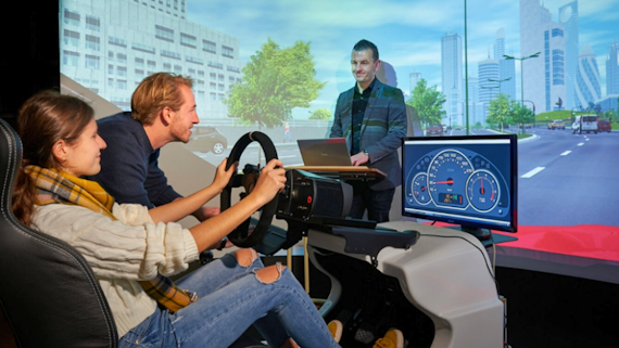 people using driving simulation