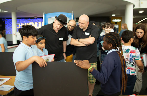 Children presenting research projects in Techniquest