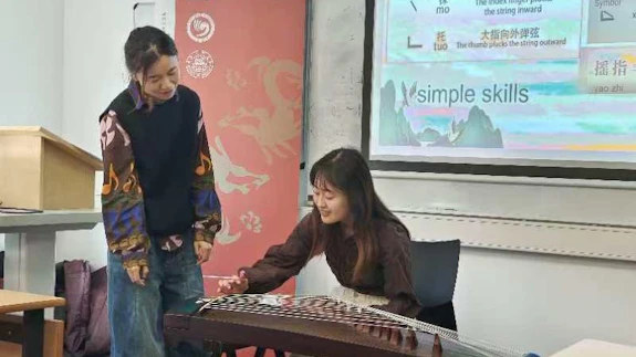 Learning to play the Guzheng