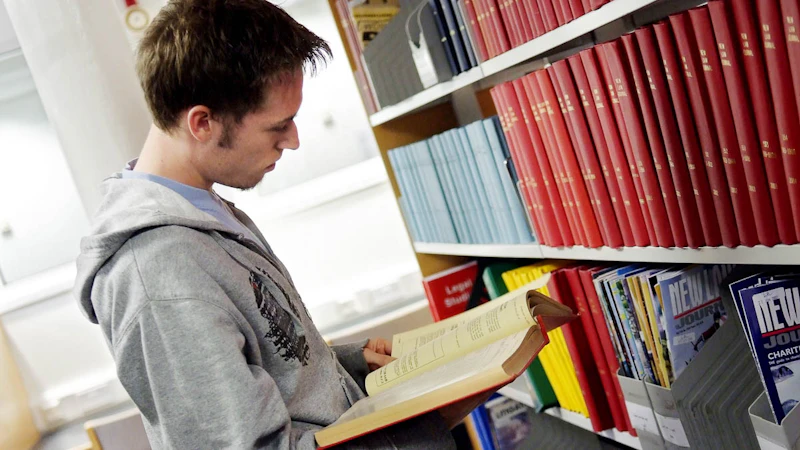 Postgraduate politics student.