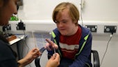 Eye test with a child with Down's syndrome