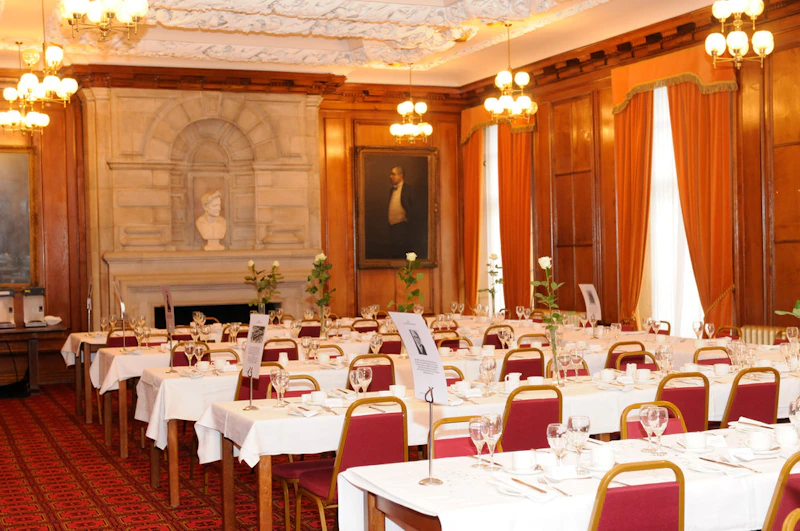 Tables laid for dinner in Glamorgan Building