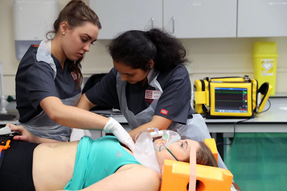 MEDIC students in simulation suite