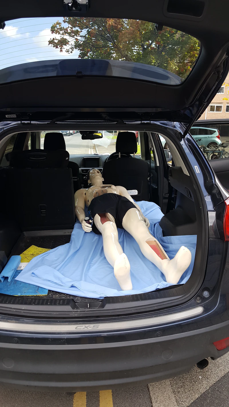 op man in car boot transport