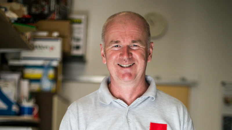 Portrait of Dave King, smiling