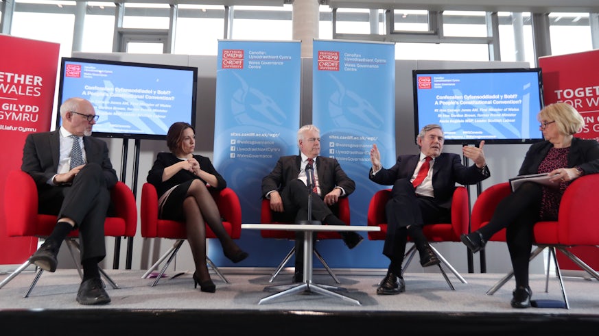 A panel of five Labour politicians sit on the stage