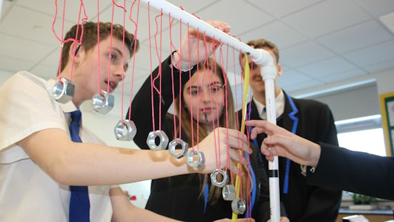 Students taking part in physics lesson 2