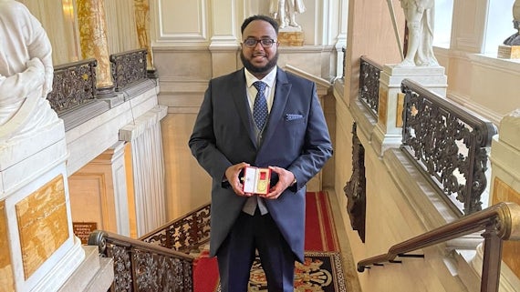 Ali Abdi with his BEM medal
