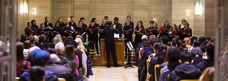 An audience gathered to watch a musical performance 