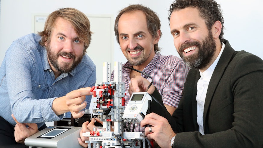 Dr Christopher Thomas, Dr Oliver Castell and Dr Sion Coulman with their bioprinter built entirely from LEGO