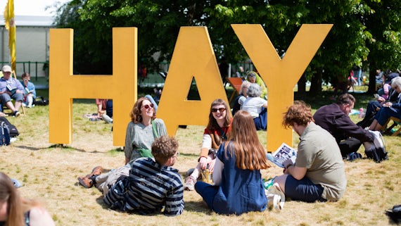 Hay Festival big yellow sign during the day