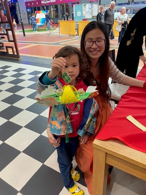 Making paper dragon boats