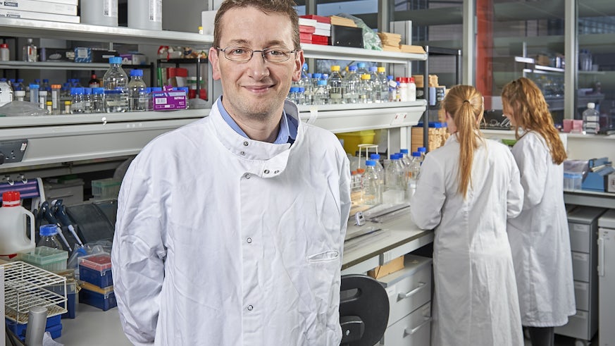 Professor Matt Smalley stood in lab