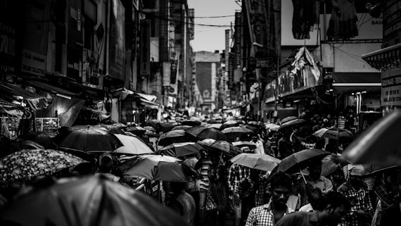 Crowded street in rain