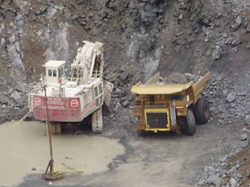 Excavator and dump truck from Mokgalakwena PGE mine in South Africa