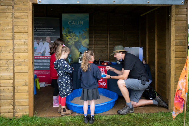 Professor Arwyn Jones engages with children at the National Eisteddfod