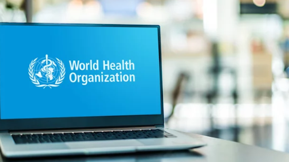 World health organization WHO logo on laptop