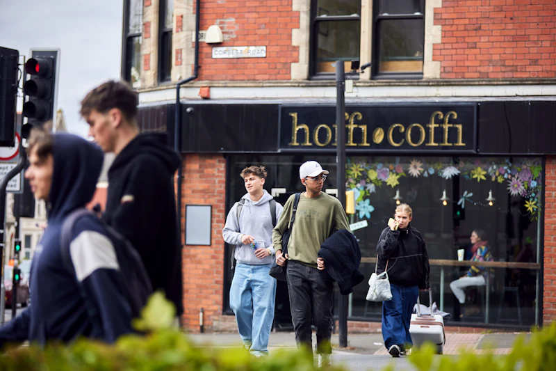 Students walking by Hoffi Coffi