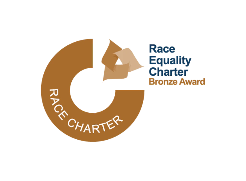 Race Equality Charter Mark Bronze Award logo - a bronze geometric image overlayed with text saying race charter