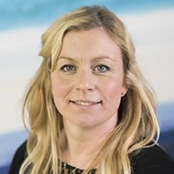 A portrait of woman with blonder hair