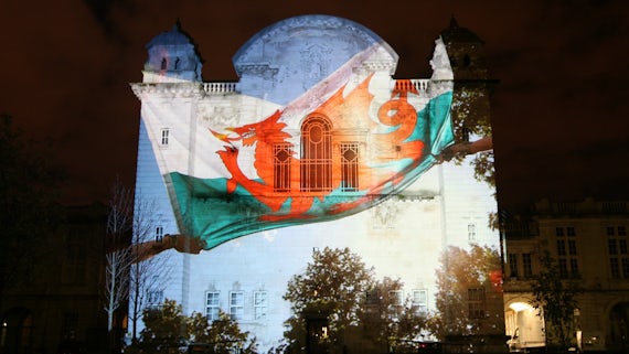 Welsh dragon projected on Main Building