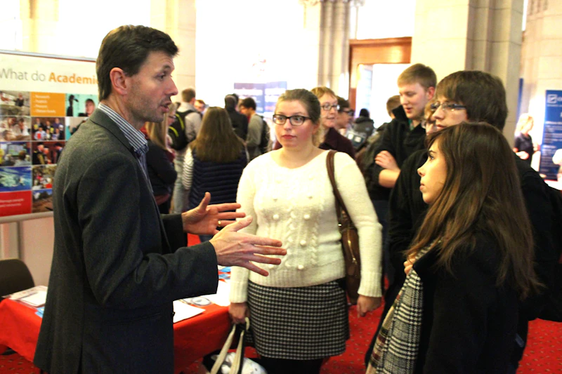 Professor Philip Davies with students at Careers Science Fair
