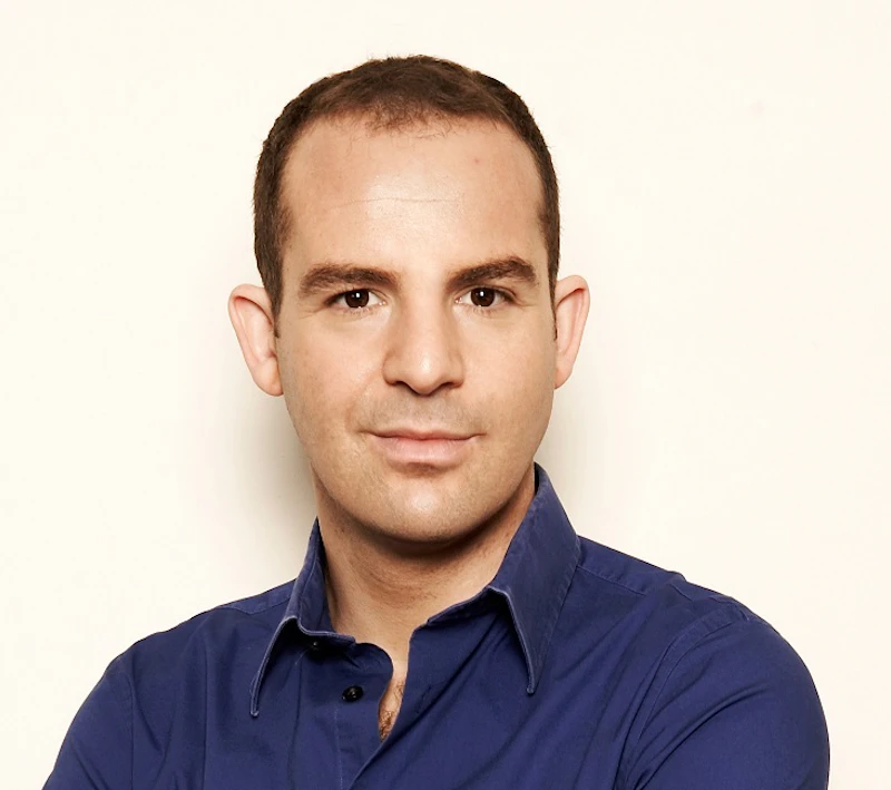 Image of a man folding his arms and looking into the camera