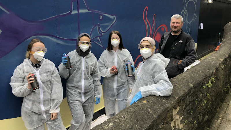 Nursery mural students painting