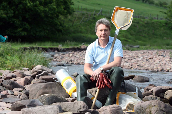 Image of Steve Ormerod sat by a river