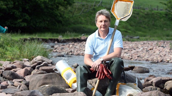 Image of Steve Ormerod sat by a river