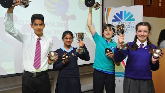 4 students with their trophies