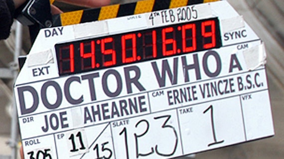Clapboard with 'Doctor Who: Director - Joe Ahearne, Camera - Ernie Vincze' printed on it