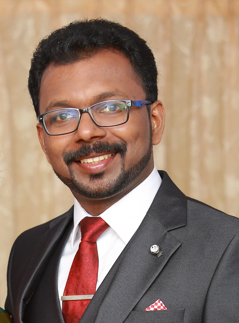 Dr Abin Thomas