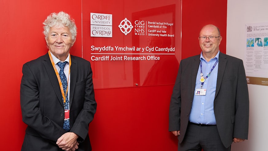 (L-R) Professor Ian Weeks, Pro Vice-Chancellor for the College of Biomedical and Life Sciences at Cardiff University, and Len Richards, Chief Executive of Cardiff and Vale University Health Board