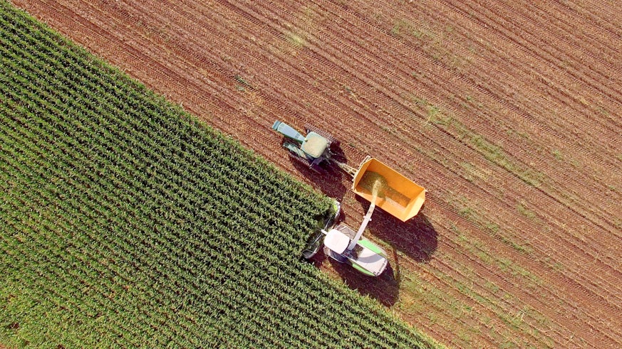 Image of combine harvester in field