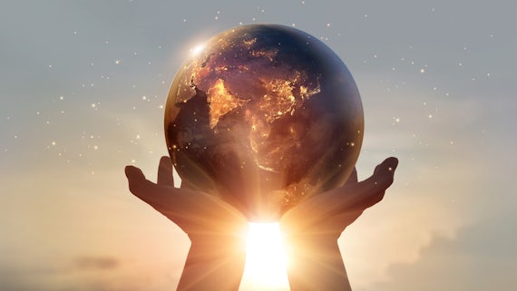 Image showing some hands holding a globe.